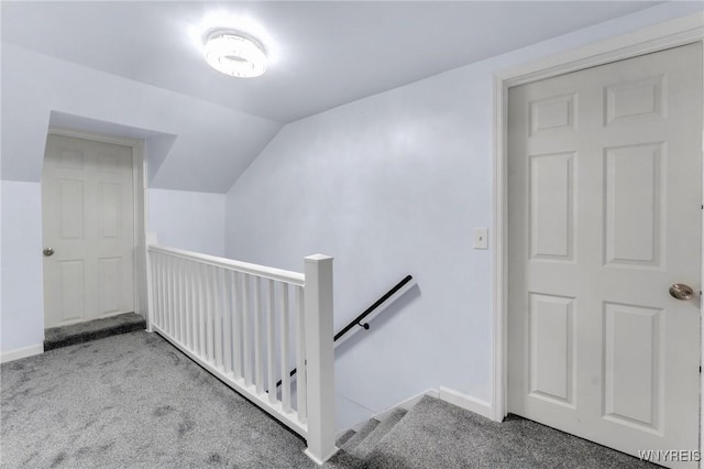 23 Lombardy St, Lancaster, NY 14086 - staircase with carpet and lofted ceiling