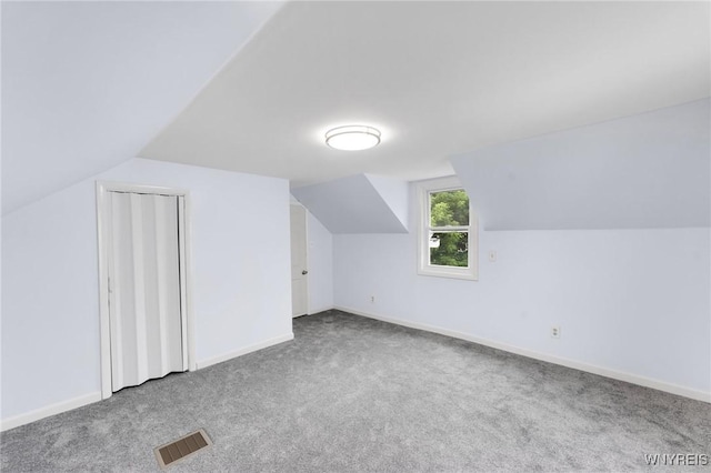 23 Lombardy St, Lancaster, NY 14086 - bonus room featuring carpet floors and vaulted ceiling