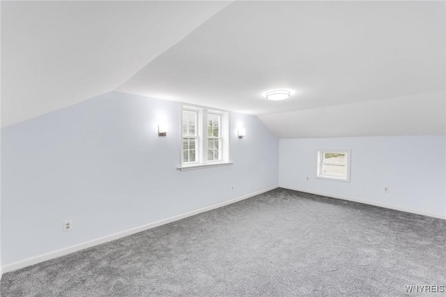 23 Lombardy St, Lancaster, NY 14086 - additional living space with vaulted ceiling and carpet