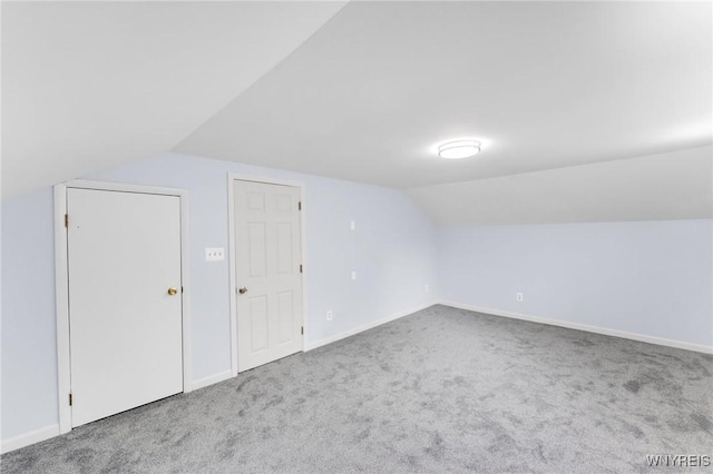 23 Lombardy St, Lancaster, NY 14086 - additional living space featuring vaulted ceiling and carpet floors