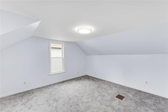 23 Lombardy St, Lancaster, NY 14086 - bonus room featuring carpet floors and vaulted ceiling