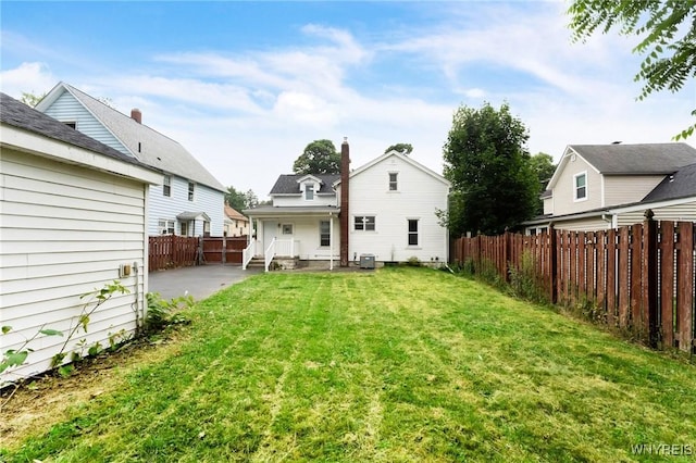 23 Lombardy St, Lancaster, NY 14086 - back of property with a patio area