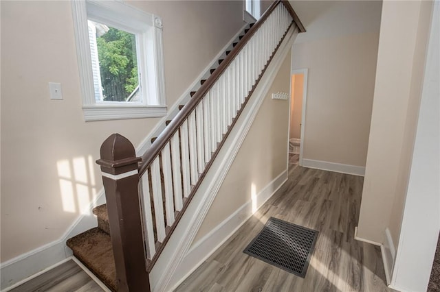 17 Orchard St, Canisteo, NY 14823 - staircase featuring wood finished floors and baseboards