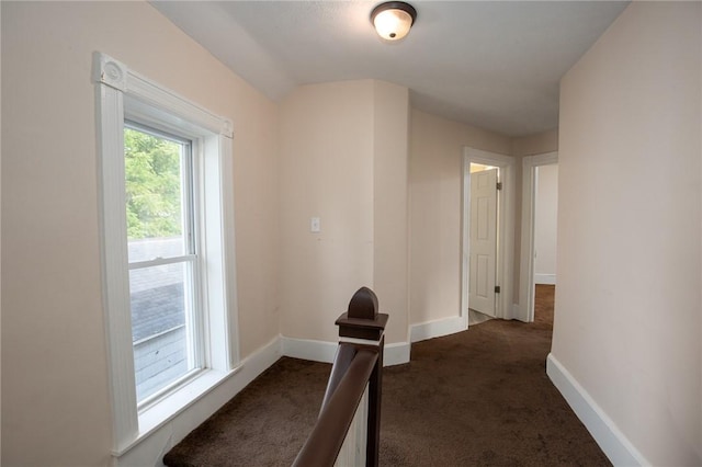 17 Orchard St, Canisteo, NY 14823 - hallway featuring dark colored carpet and baseboards