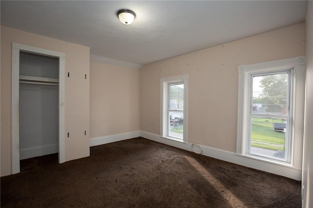17 Orchard St, Canisteo, NY 14823 - unfurnished bedroom with carpet floors, multiple windows, and a closet