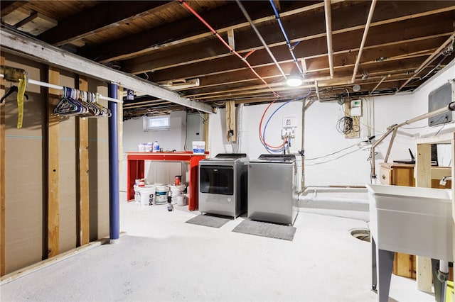 773 Marshall Rd, Chili, NY 14624 - below grade area featuring washer and dryer and electric panel