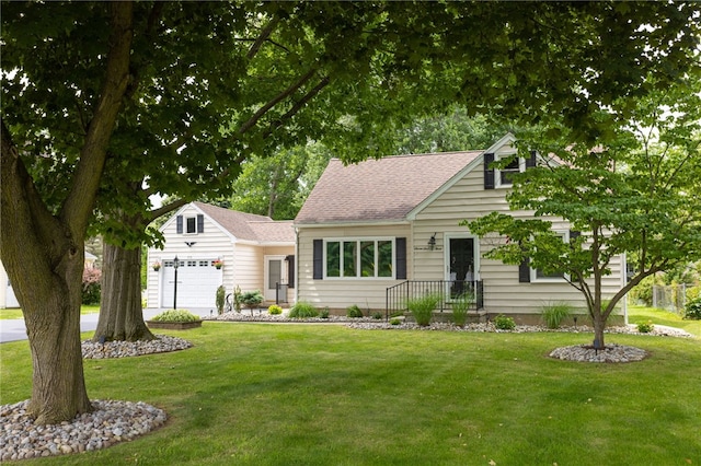 773 Marshall Rd, Chili, NY 14624 - view of front of house featuring a front lawn, roof with shingles, and an attached garage