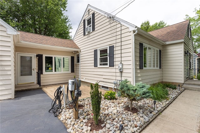 773 Marshall Rd, Chili, NY 14624 - view of property exterior with a shingled roof and cooling unit