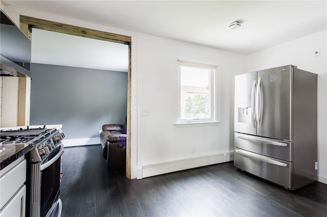 773 Marshall Rd, Chili, NY 14624 - kitchen with stainless steel appliances, a baseboard heating unit, dark wood-style floors, and dark countertops