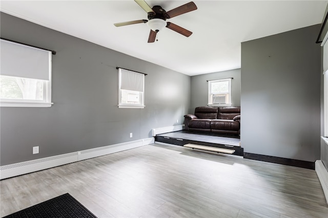 773 Marshall Rd, Chili, NY 14624 - sitting room featuring wood finished floors, ceiling fan, and cooling unit