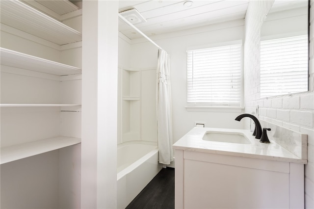 773 Marshall Rd, Chili, NY 14624 - full bathroom with vanity, wood finished floors, and shower / tub combo with curtain