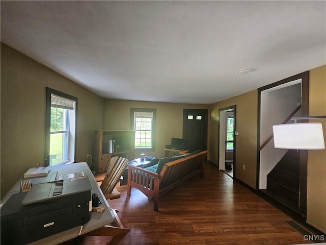 147 N St, Constantia, NY 13042 - living area featuring wood finished floors, stairway, and an office area