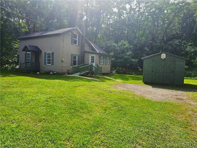 147 N St, Constantia, NY 13042 - view of property exterior featuring a storage shed and a lawn