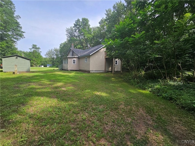 147 N St, Constantia, NY 13042 - view of grassy yard with a storage shed