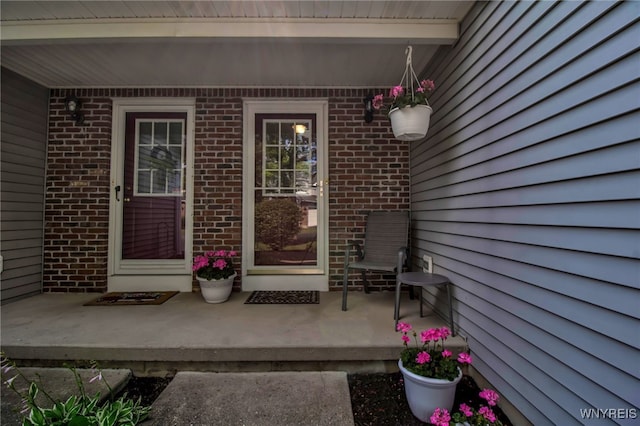 21 Towne Square Dr, Lancaster, NY 14086 - property entrance featuring brick siding