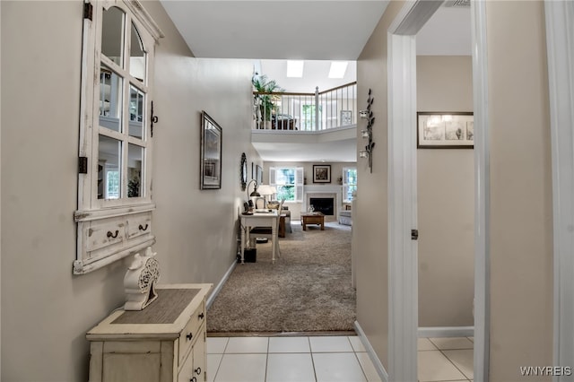 21 Towne Square Dr, Lancaster, NY 14086 - hall with carpet flooring, tile patterned floors, and a high ceiling