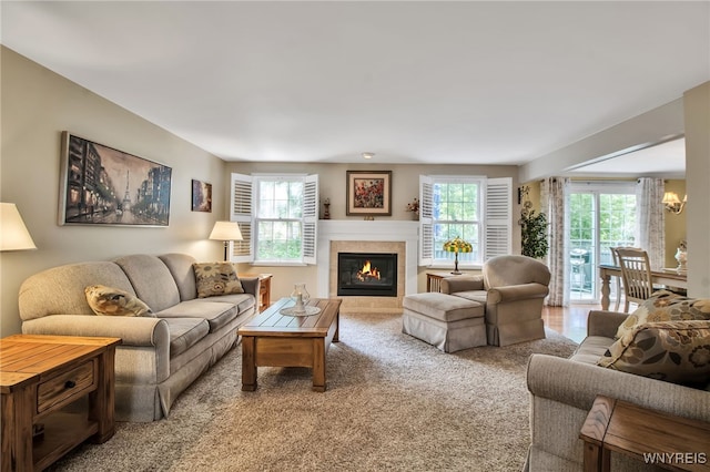 21 Towne Square Dr, Lancaster, NY 14086 - living room featuring plenty of natural light, a tile fireplace, and carpet floors