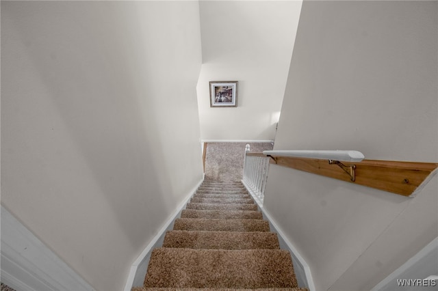 21 Towne Square Dr, Lancaster, NY 14086 - stairway featuring carpet floors and baseboards