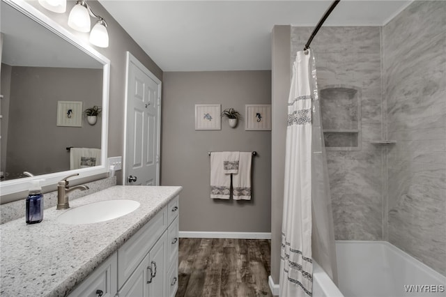 21 Towne Square Dr, Lancaster, NY 14086 - full bathroom featuring vanity, shower / bath combo, and wood finished floors