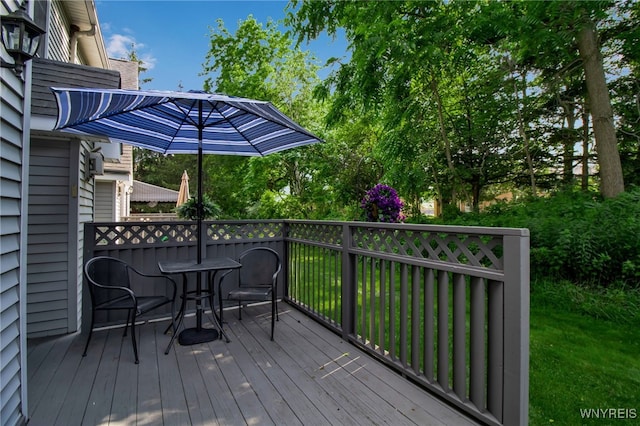 21 Towne Square Dr, Lancaster, NY 14086 - wooden deck with outdoor dining space and a yard
