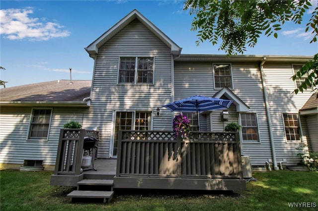 21 Towne Square Dr, Lancaster, NY 14086 - rear view of house featuring a deck and a lawn