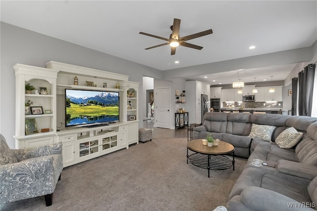 6132 Railroad St, Clarence, NY 14032 - living area with a ceiling fan, recessed lighting, and carpet flooring