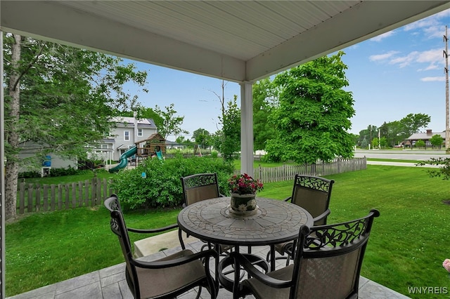 6132 Railroad St, Clarence, NY 14032 - view of patio with outdoor dining space and a playground