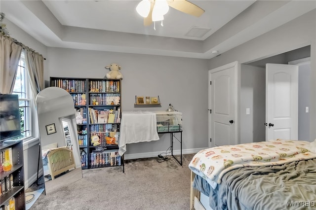 6132 Railroad St, Clarence, NY 14032 - carpeted bedroom with a tray ceiling and baseboards