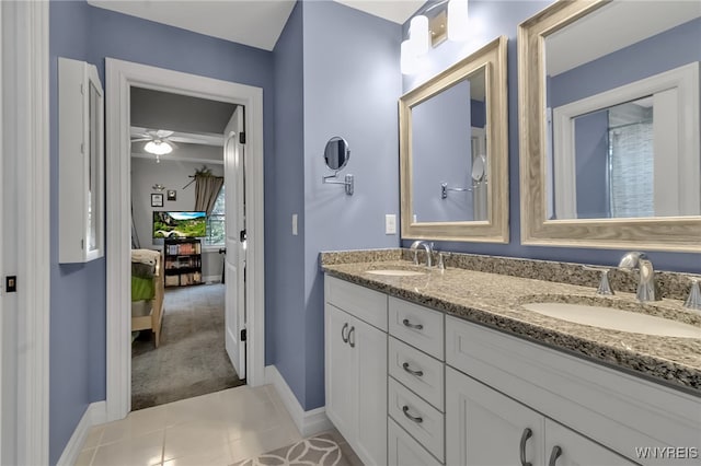 6132 Railroad St, Clarence, NY 14032 - ensuite bathroom with double vanity and tile patterned flooring