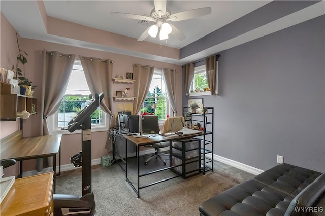 6132 Railroad St, Clarence, NY 14032 - office area featuring carpet floors, a ceiling fan, and a tray ceiling