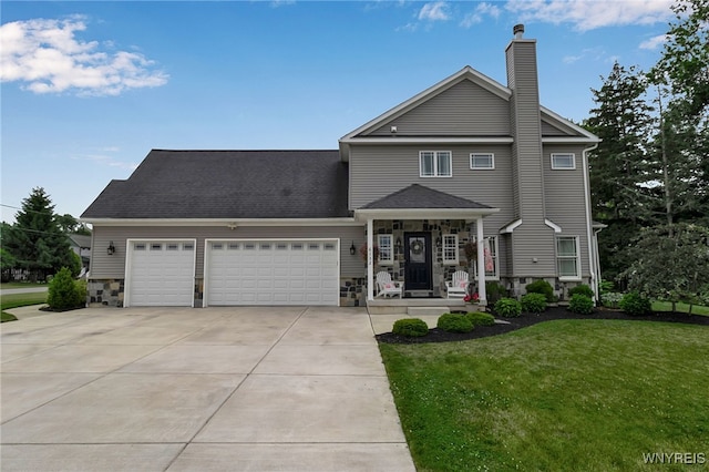 6132 Railroad St, Clarence, NY 14032 - view of front of home with a garage, driveway, a front yard, a chimney, and stone siding