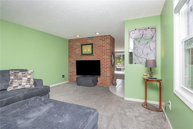 15 Kearney Dr, Irondequoit, NY 14617 - carpeted living area with a fireplace and baseboards