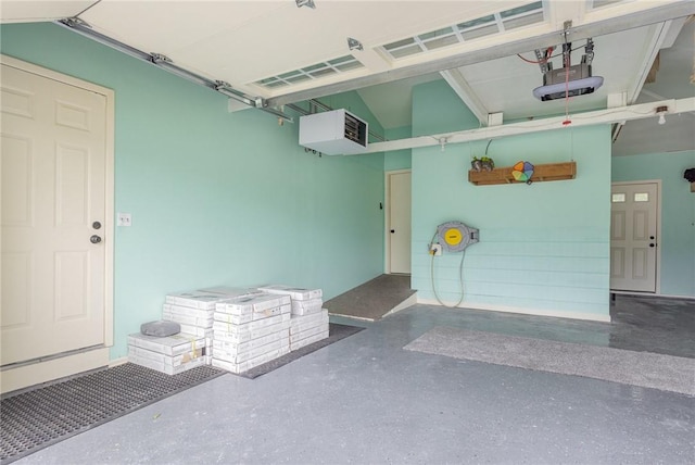 15 Kearney Dr, Irondequoit, NY 14617 - garage featuring a garage door opener and a heating unit