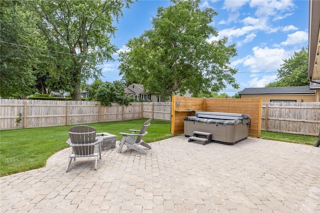 15 Kearney Dr, Irondequoit, NY 14617 - fenced backyard with a patio, a hot tub, and an outdoor fire pit
