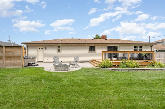 15 Kearney Dr, Irondequoit, NY 14617 - back of house with a wooden deck, an outdoor fire pit, a patio area, and a chimney