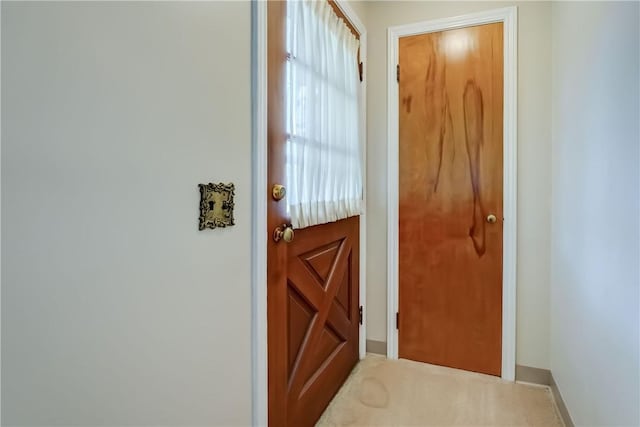 3201 Elmwood Ave, Brighton, NY 14618 - doorway to outside featuring baseboards and carpet floors