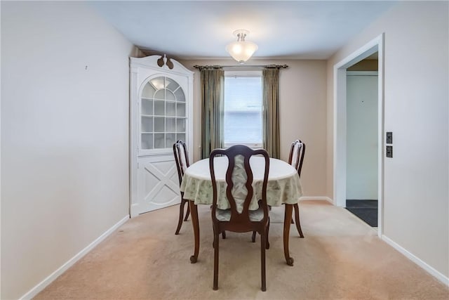 3201 Elmwood Ave, Brighton, NY 14618 - dining area featuring light colored carpet and baseboards