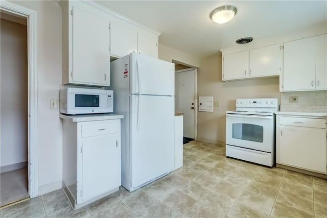 3201 Elmwood Ave, Brighton, NY 14618 - kitchen with white appliances, light countertops, white cabinets, and backsplash
