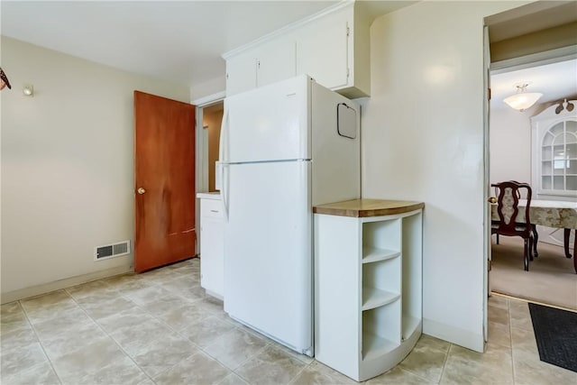 3201 Elmwood Ave, Brighton, NY 14618 - kitchen with freestanding refrigerator and white cabinets