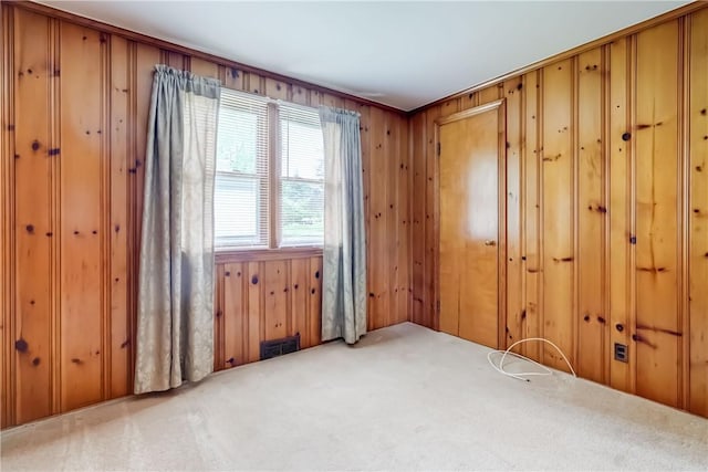 3201 Elmwood Ave, Brighton, NY 14618 - carpeted spare room featuring wooden walls