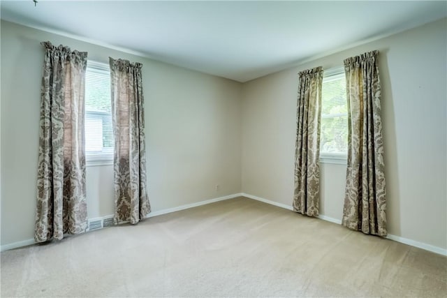 3201 Elmwood Ave, Brighton, NY 14618 - carpeted spare room featuring baseboards