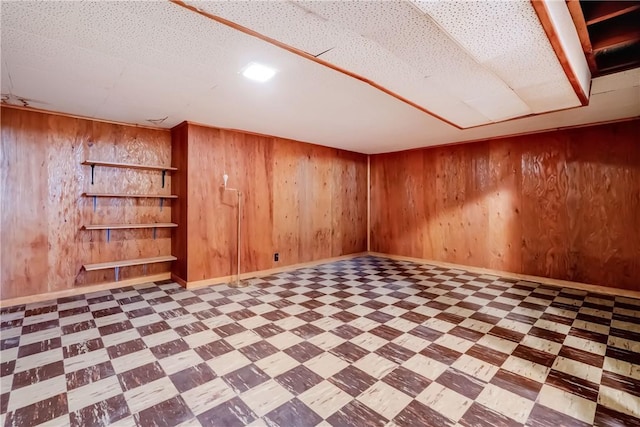 3201 Elmwood Ave, Brighton, NY 14618 - finished basement with tile patterned floors and wooden walls