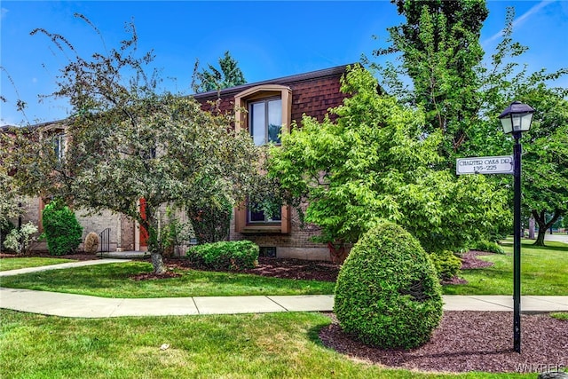135 Charter Oaks Dr Unit 1, Amherst, NY 14228 - view of front of house with a front lawn