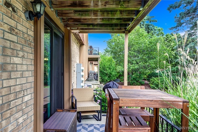 135 Charter Oaks Dr Unit 1, Amherst, NY 14228 - wooden deck with outdoor dining space