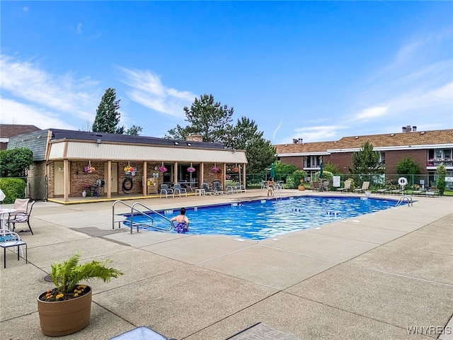 135 Charter Oaks Dr Unit 1, Amherst, NY 14228 - community pool with a patio