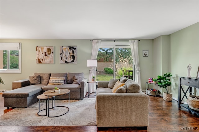 135 Charter Oaks Dr Unit 1, Amherst, NY 14228 - living room with dark wood-type flooring and plenty of natural light