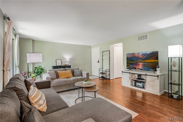 135 Charter Oaks Dr Unit 1, Amherst, NY 14228 - living area featuring wood finished floors