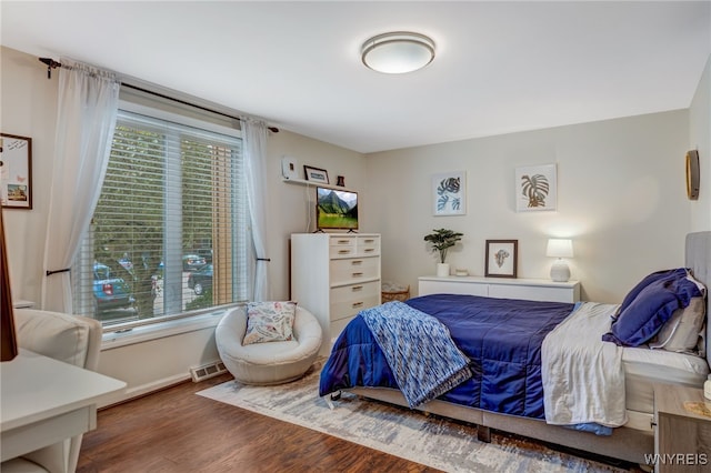 135 Charter Oaks Dr Unit 1, Amherst, NY 14228 - bedroom with wood finished floors and baseboards