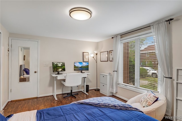 135 Charter Oaks Dr Unit 1, Amherst, NY 14228 - bedroom with wood finished floors and baseboards
