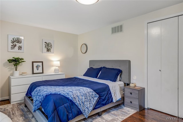 135 Charter Oaks Dr Unit 1, Amherst, NY 14228 - bedroom with wood finished floors and a closet
